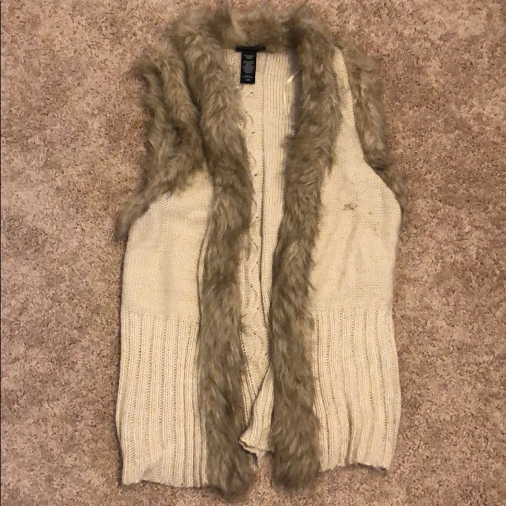 Faux fur and kitted vest